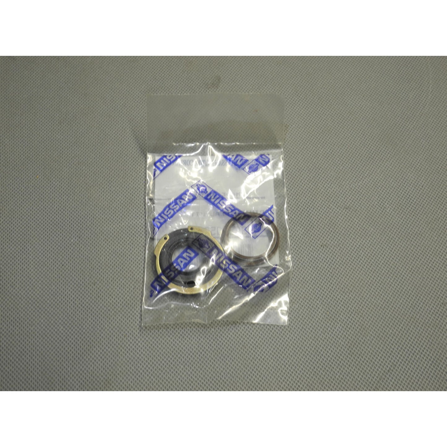 Brand NEW Genuine OEM Pinion Seal Kit 49365-Q5225 For Nissan